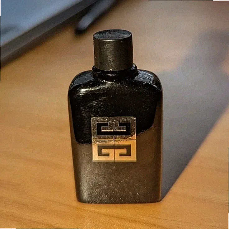 Givenchy Gentleman Black Designer Fragrance Bottle with Logo, Elegant Scent